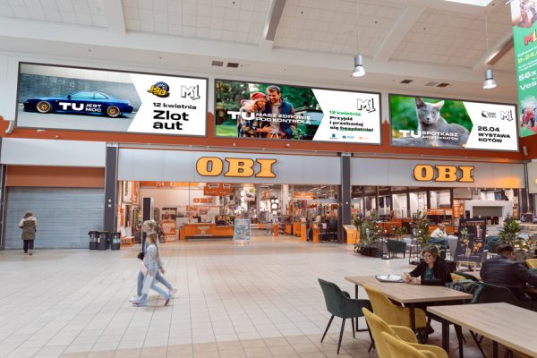 Powierzchnie reklamowe w M1 Kraków, banery k1, k2, k3, znajdujące się nad wejściem do sklepu OBI.