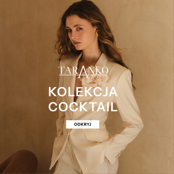 Elegancka kobieta prezentująca stylowy garnitur o nowoczesnym kroju z najnowszej kolekcji marki Taranko.