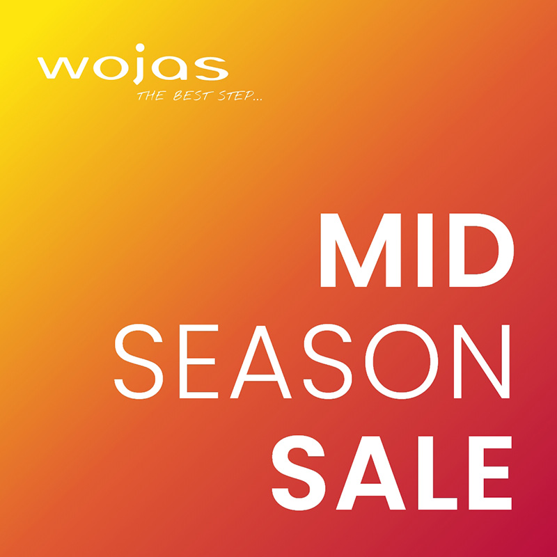 Na grafice widać pomarańczowo-żółte, gradientowe tło oraz informację o promocji Mid Season Sale marki Wojas – wybrane produkty do 40% taniej, oferta ważna od 23.04 do 31.05.